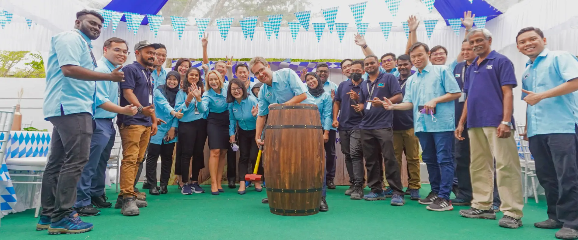 Tapping of the barrel at the grand opening of the new site of  MC-Bauchemie Malaysia